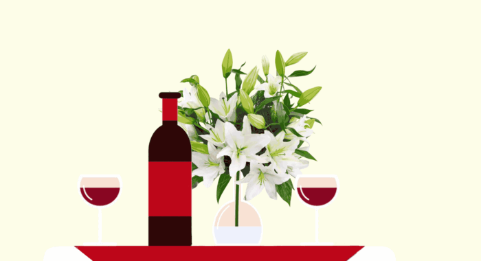 White flowers on a dinner table, white flowers in bride's hand, white flowers on a coffin.